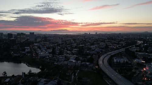 Drone Footage of Oakland City under a Sunset Sky