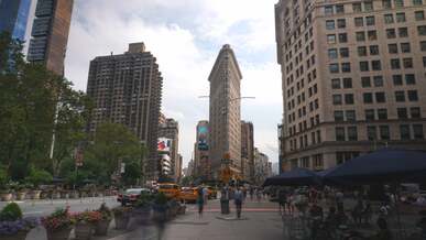 time lapse of traffic and pedestrians at flatiron district in new york