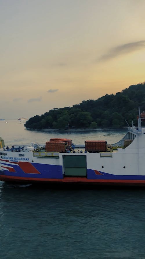 Ship in Harbor During Sunrise