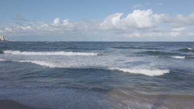 clouds over seashore