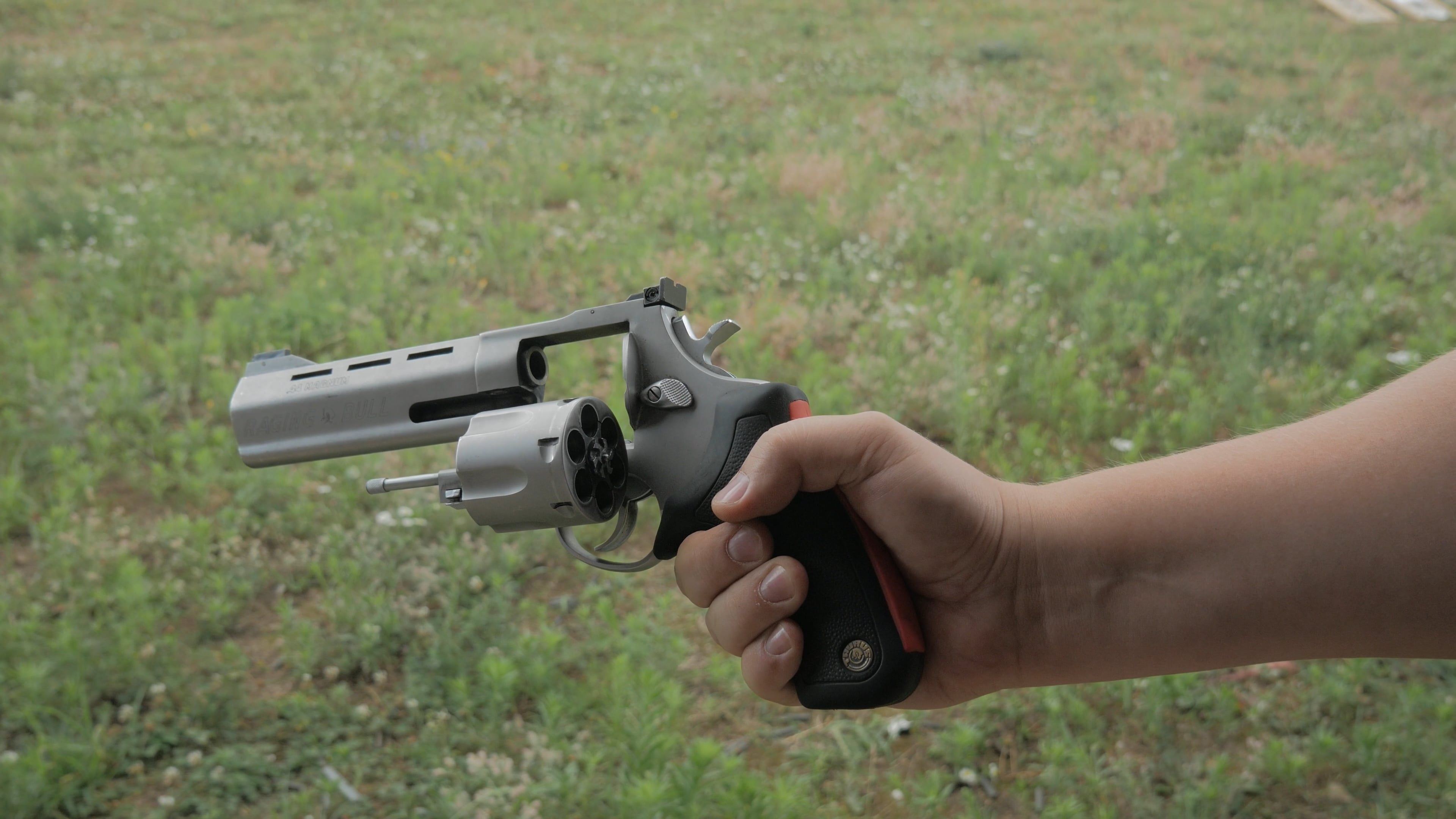 Person Holding a Revolver Free Stock Video Footage, Royalty-Free 4K ...