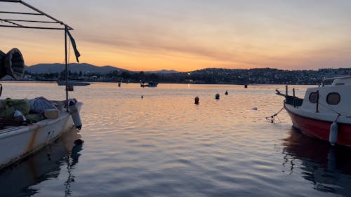 Fishing Boats Anchored in a Bay at Sunrise 