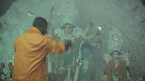 Man in Front of Altar