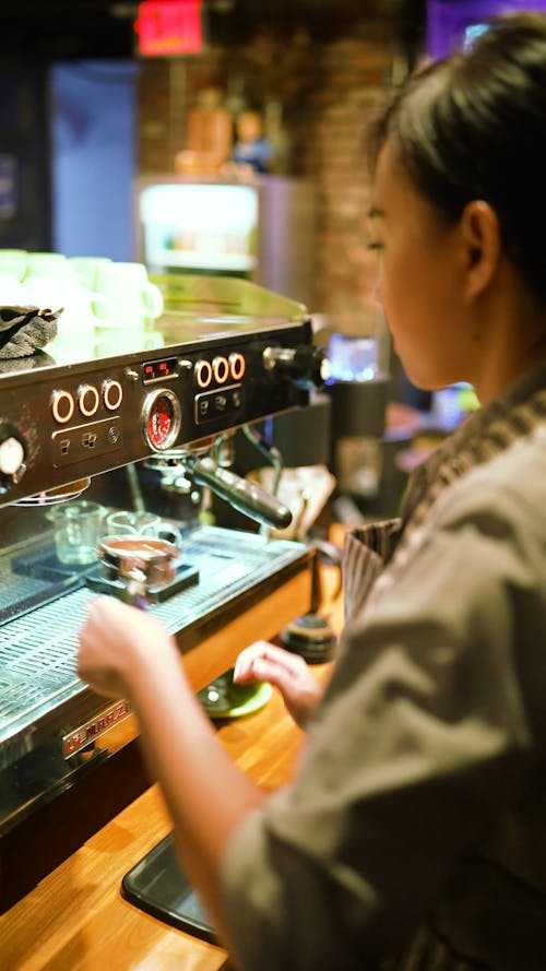 Woman Making An Espresso Shot