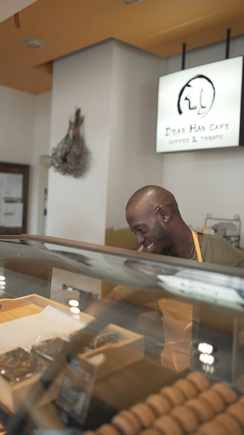 A Man Working in a Cafe