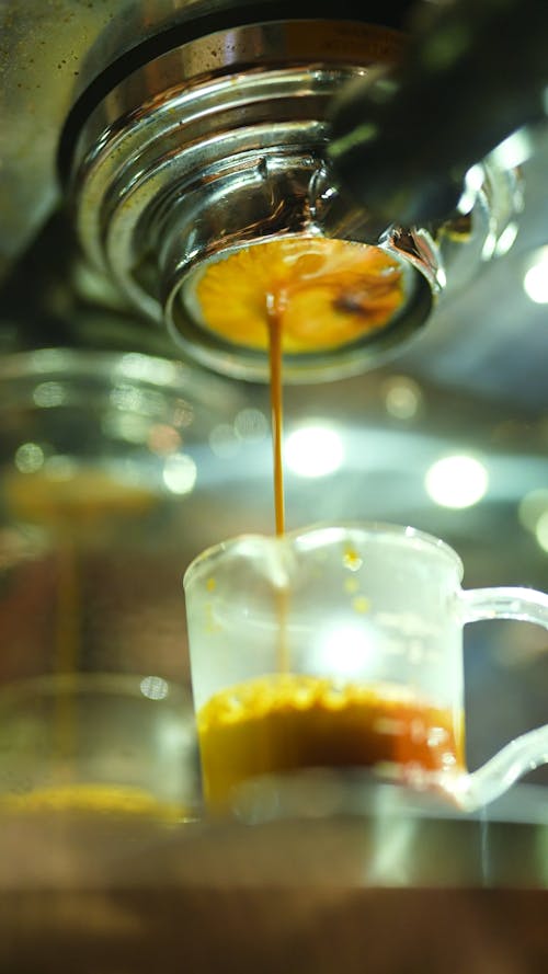 Close up of an Espresso Machine Making a Cup of Coffee 