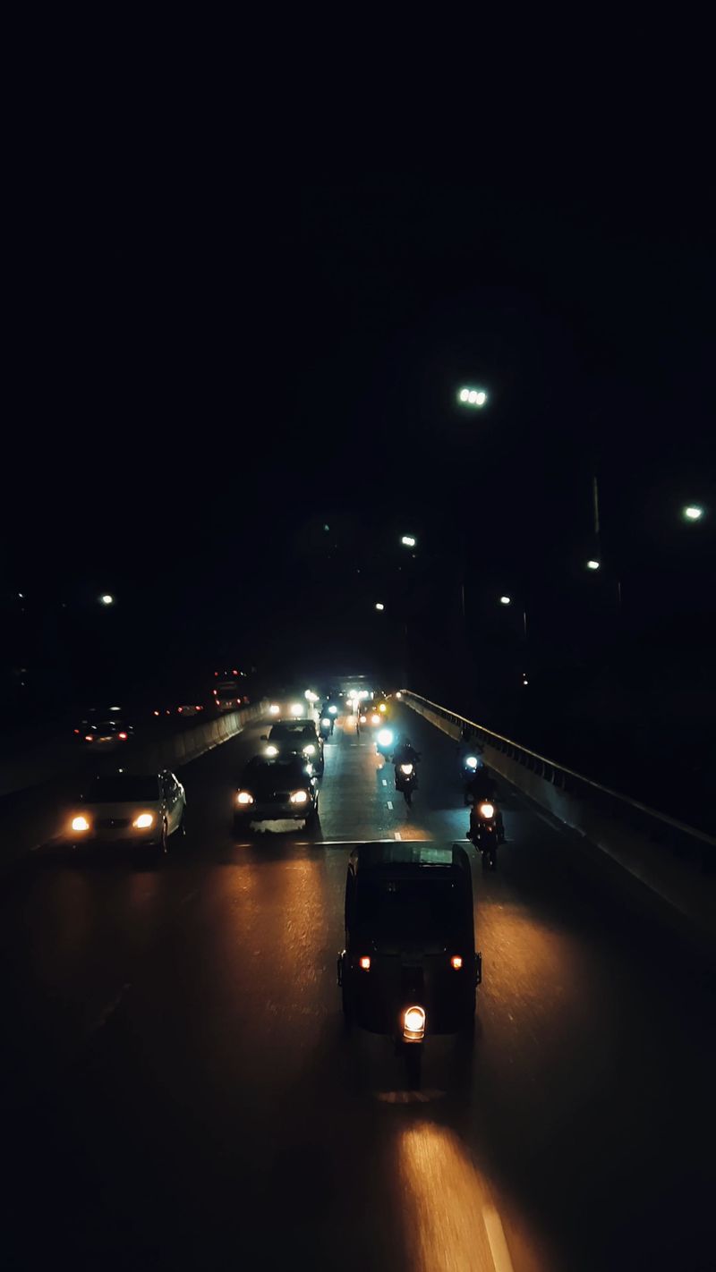 A rainy night with cars driving on the road Free Stock Video Footage ...