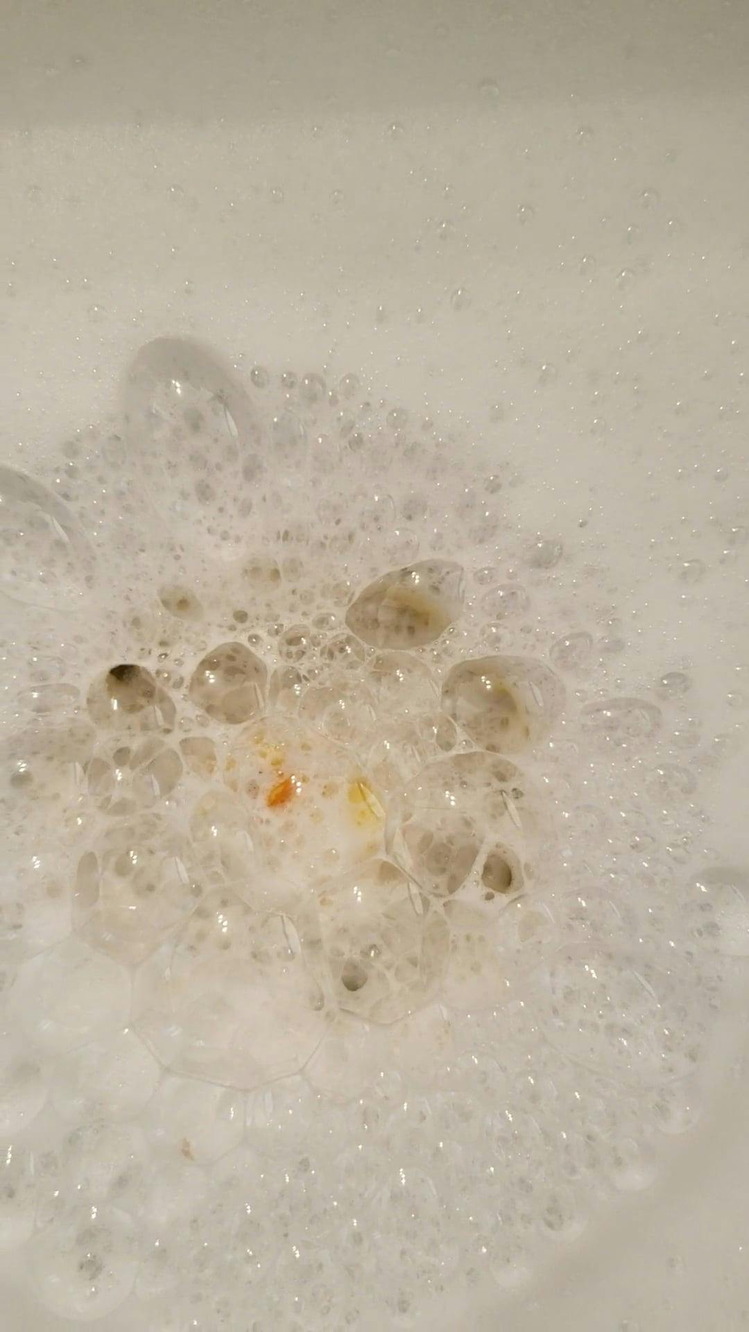 Soap Bubbles Going Through Sink Drainage Free Stock Video Footage