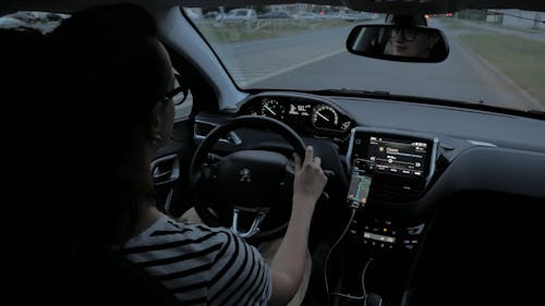 A Woman using Car