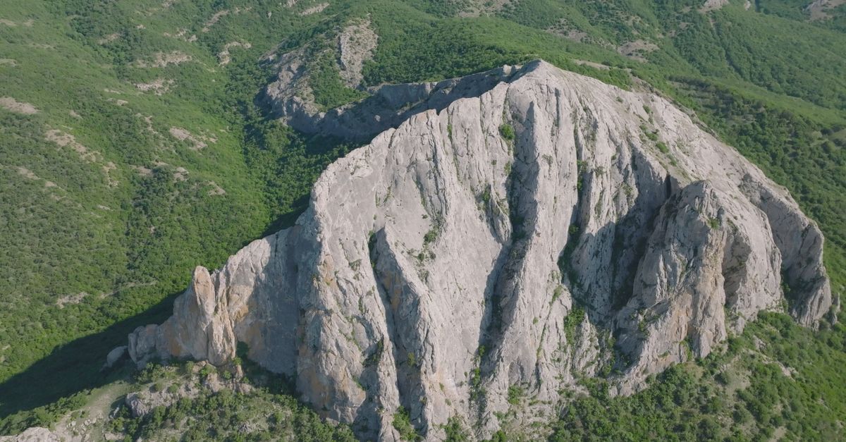 Aerial Footage of Rock in Hilly Area Free Stock Video Footage, Royalty ...