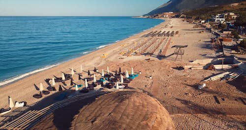 Deckchairs on Beach in Resort