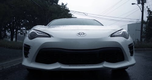 White Car on Road During Rain