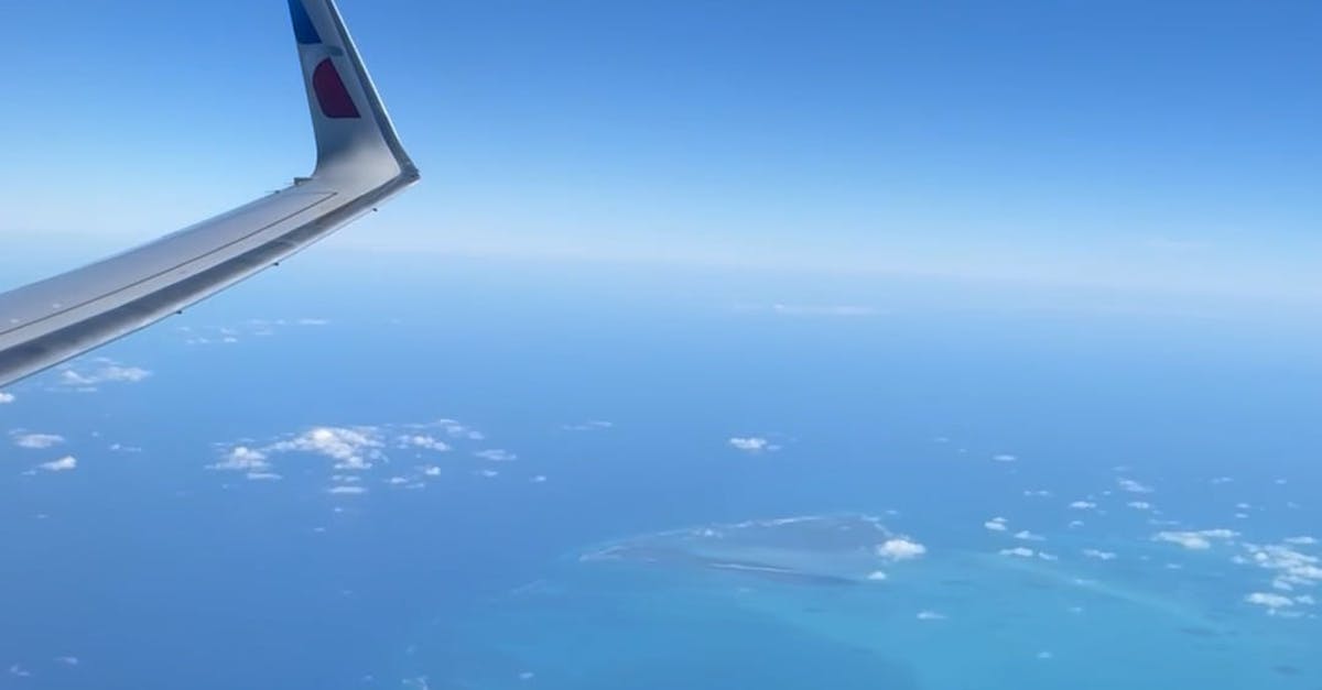 Plane Window View while Flying over the Ocean Free Stock Video Footage,  Royalty-Free 4K & HD Video Clip