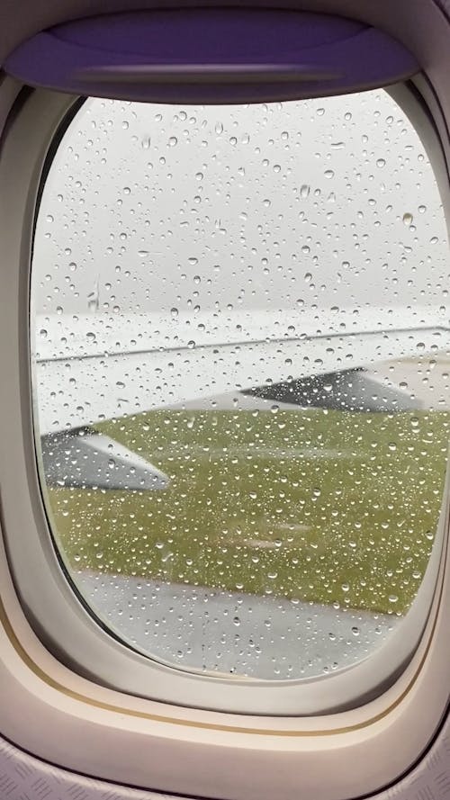Airplane Taxing During Rain