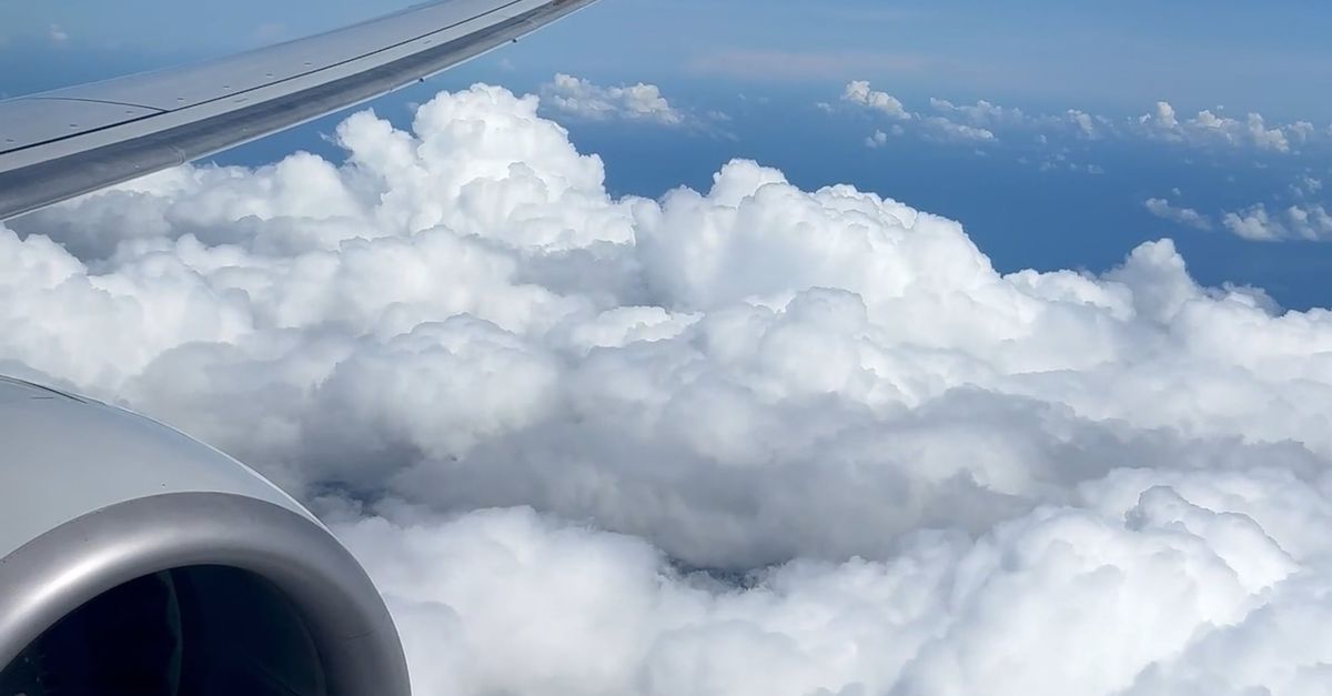 Plane Window View while Flying above the Clouds Free Stock Video ...