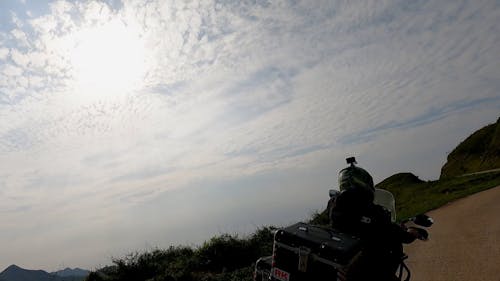 Motorcyclists on Road in Mountains