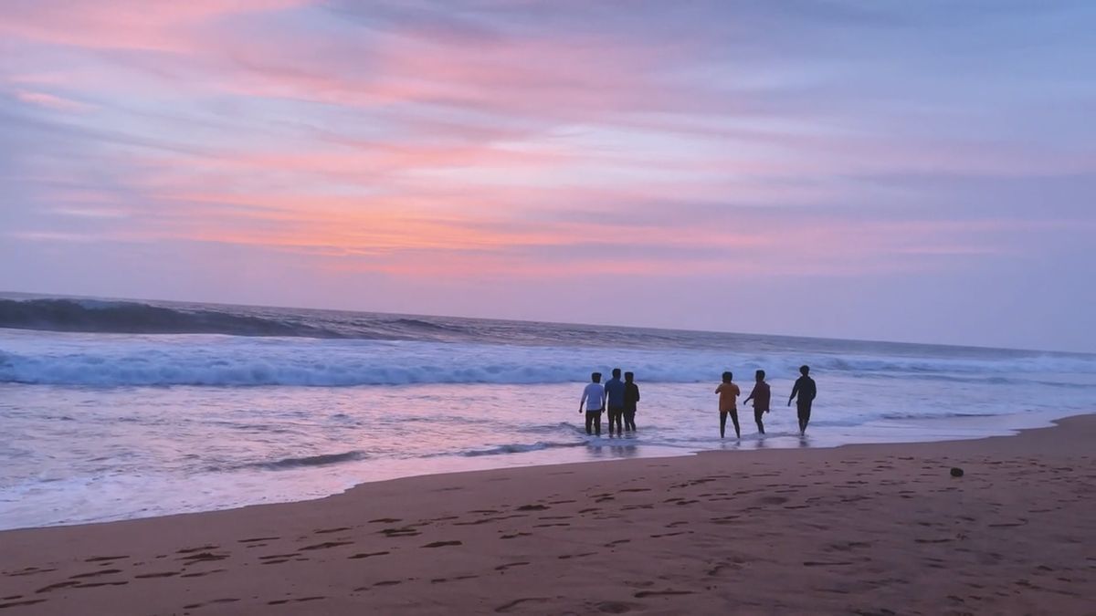 Tranquil Beach Sunset with Silhouetted People Free Stock Video Footage ...