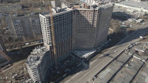 Aerial View of a Construction Site by a Highway 