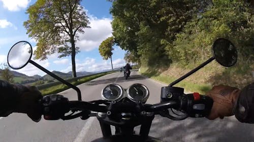 Riding Motorcycle on Road