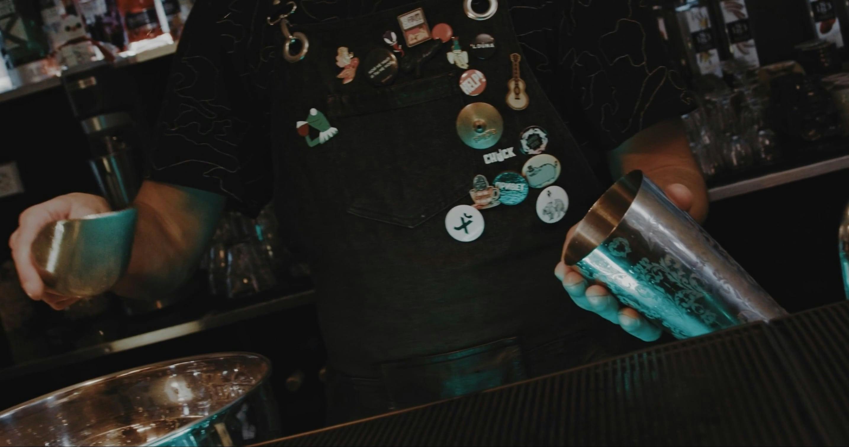 A Bartender Performing a Trick with a Cocktail Shaker Free Stock Video