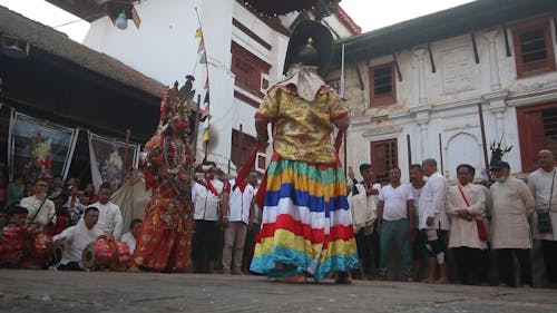 People in Costumes Dancing during a Festival in Nepal 