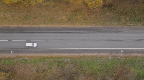 High Angle Shot of Moving Cars on Road 