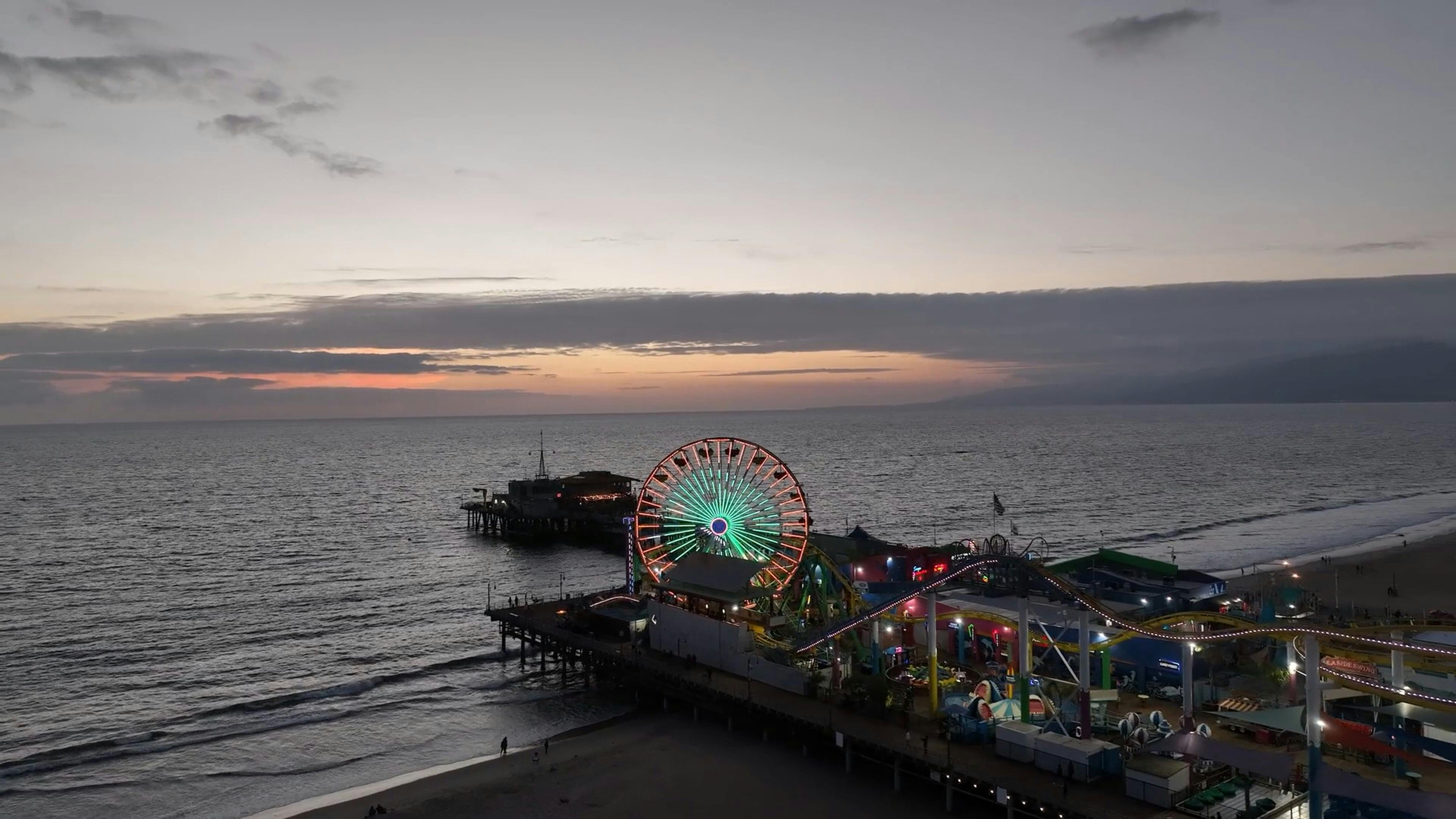 Drone View of Pacific Park on Santa Monica Pier at Dusk Free Stock