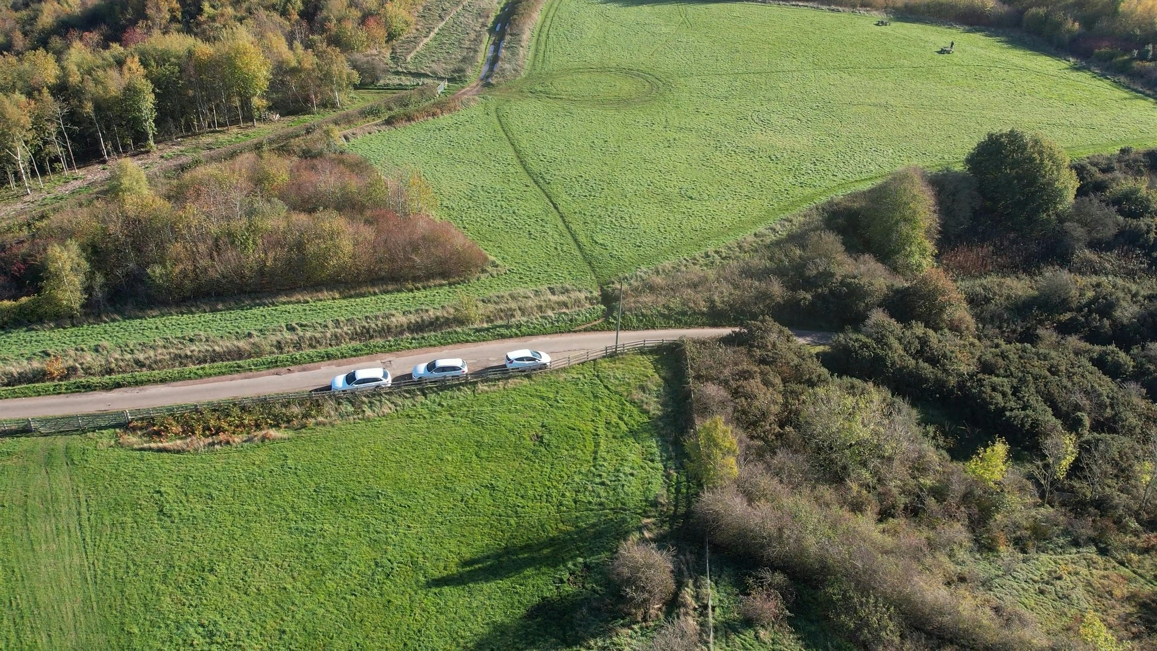 Three White Cars Park on the Road Free Stock Video Footage, Royalty
