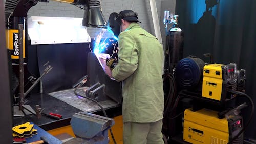 A Man Doing Welding