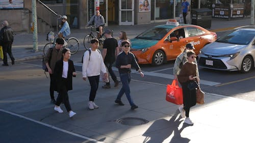Pedestrians in the Streets of Toronto City in Ontario, Canada 
