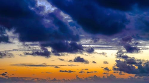 Purple cloud golden sky lapse 