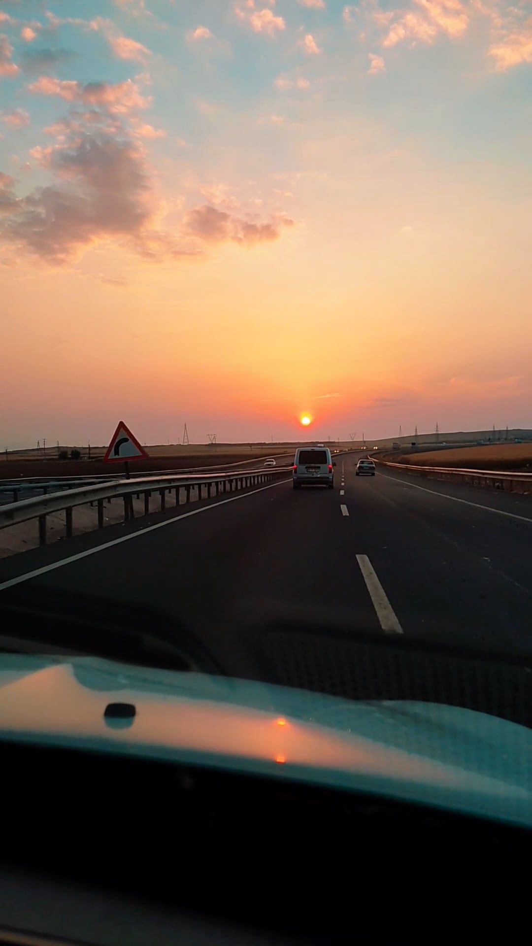 Driving into a Vibrant Sunset on Open Road Free Stock Video Footage ...