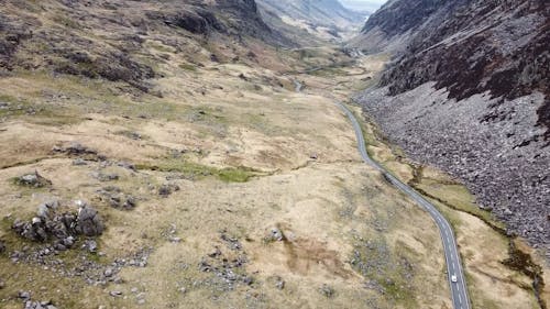 Moving Cars on Long Road at Snowdon