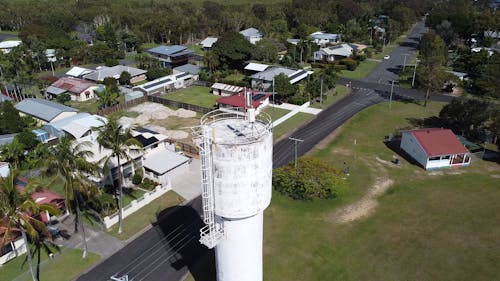 Drone Footage of a Water Tank in a Small Town