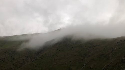 Low Clouds over a Mountain Landscape