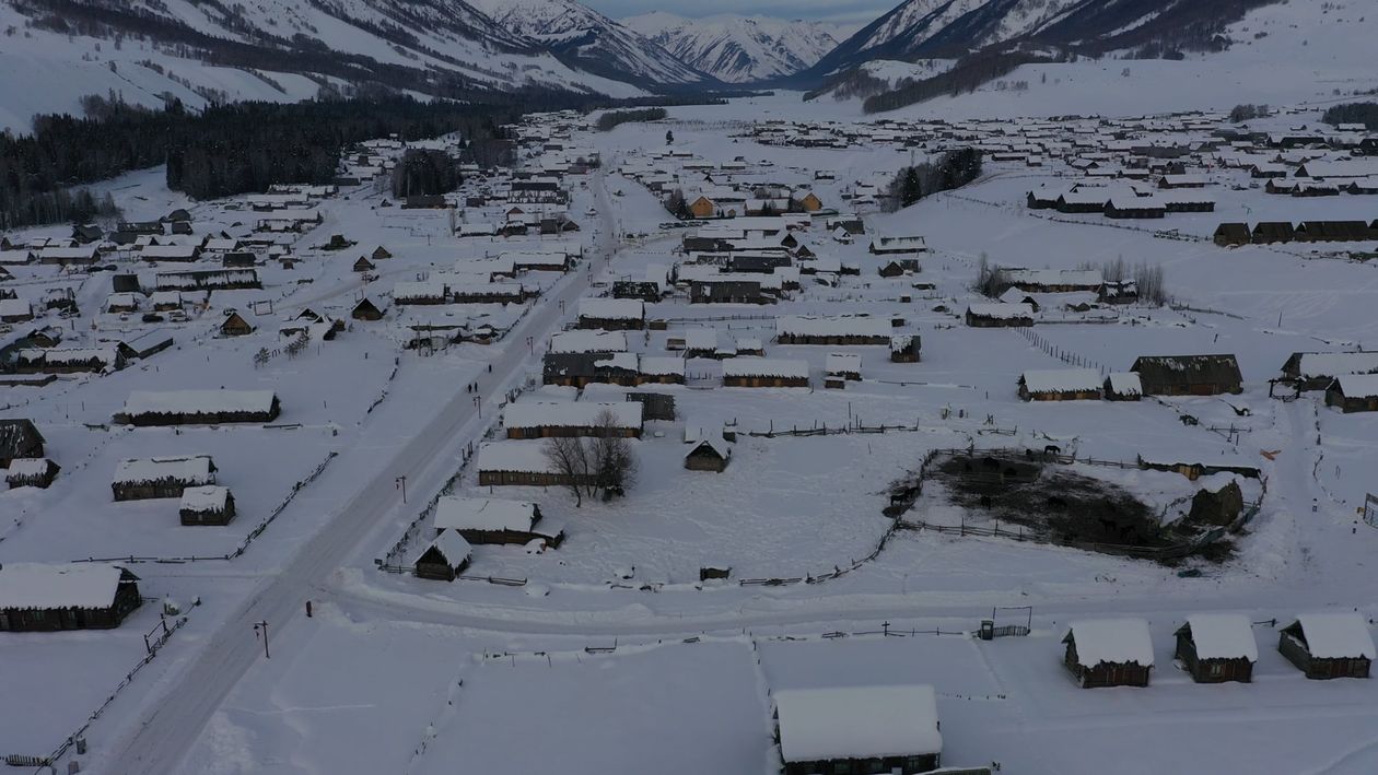 Drone Footage of a Mountain Village Covered in Snow Free Stock Video ...