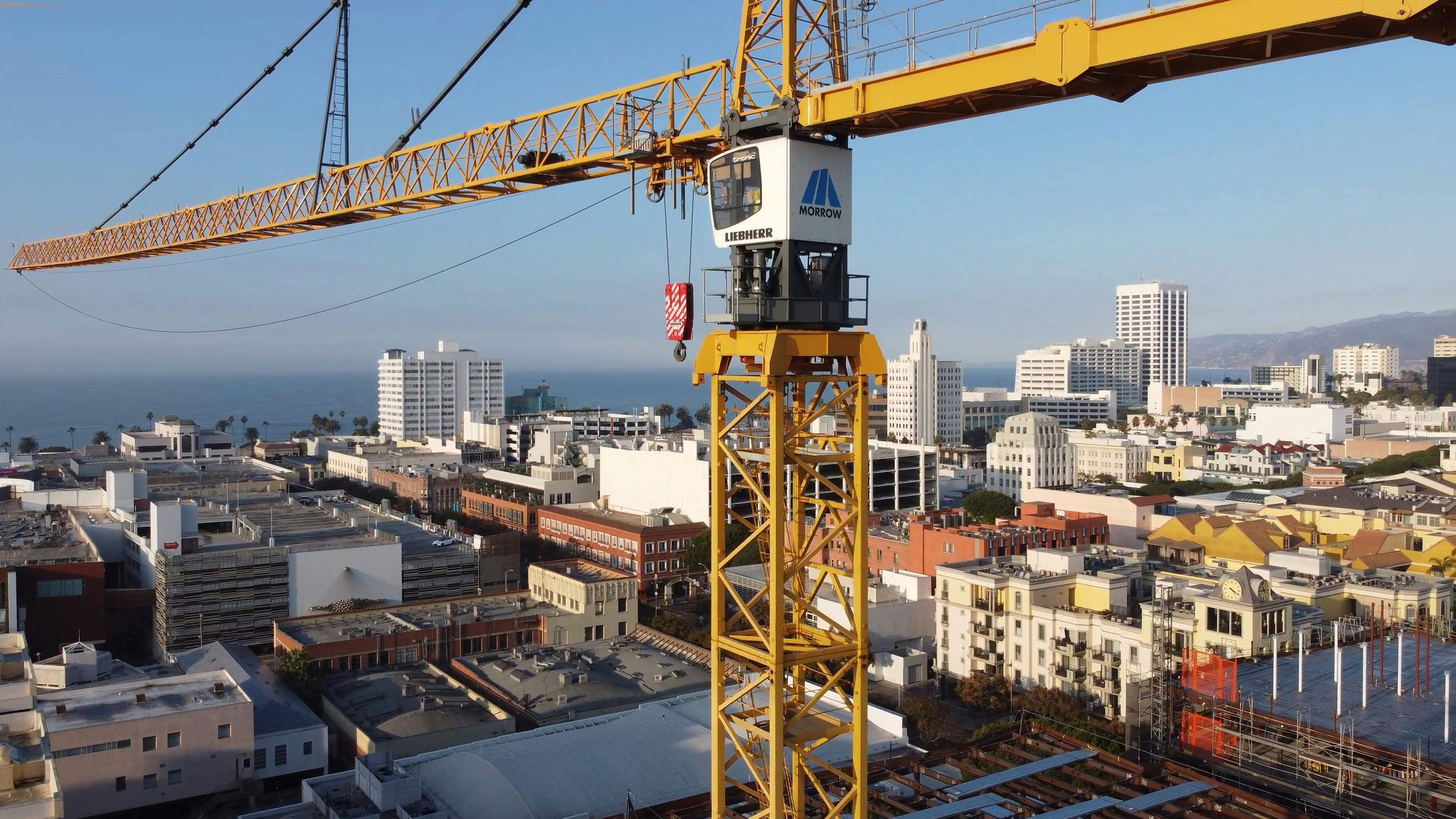 Drone Footage of a Crane at a Construction Site Free Stock Video
