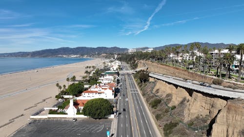 Drone View of Traffic on a Coastal City Highway