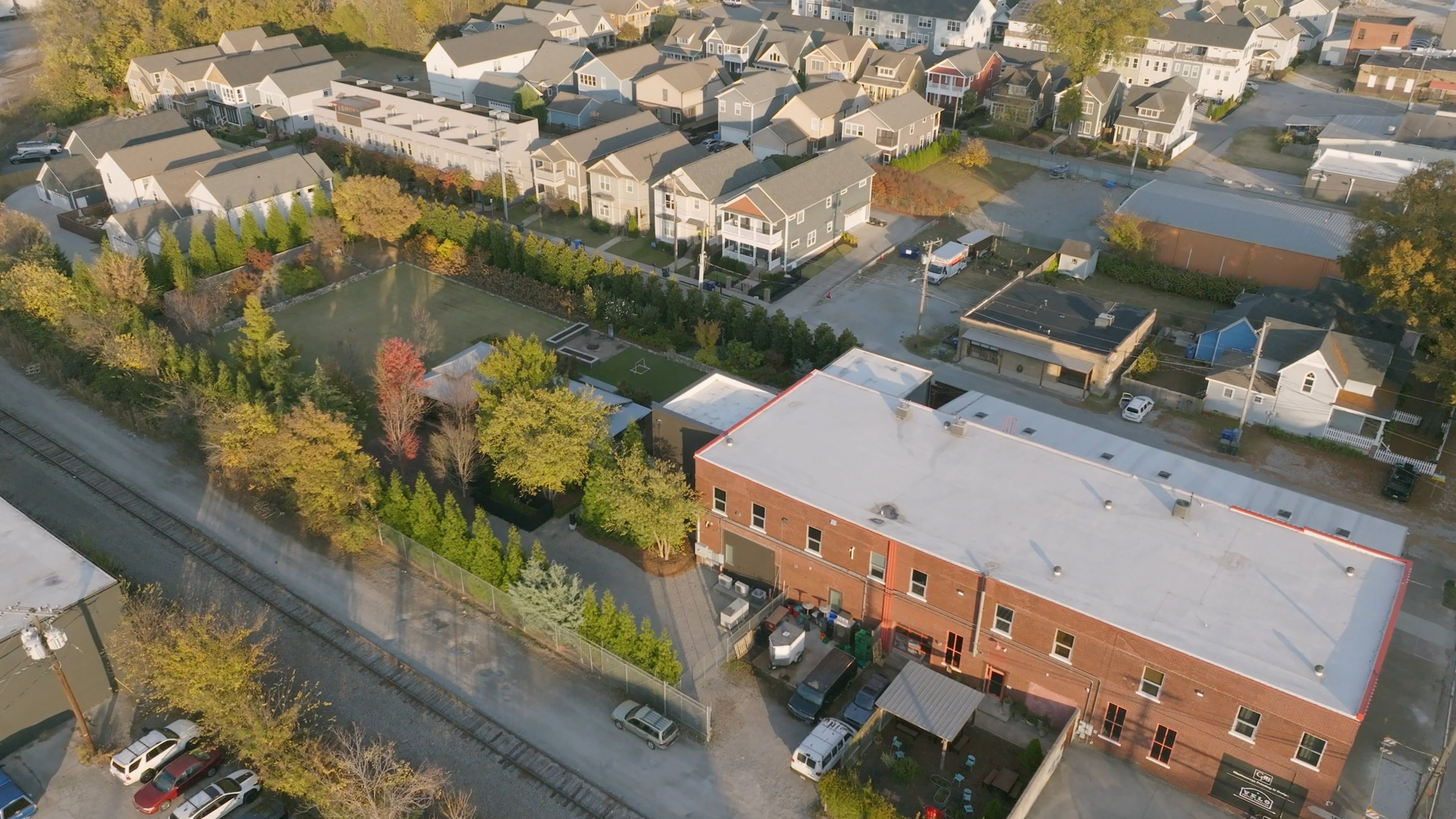 Drone Footage Above a City Street and Houses Free Stock Video Footage ...