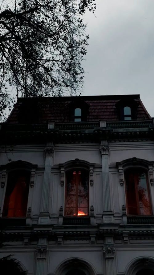 Face of a scared girl in a haunted mansion - Free Stock Video