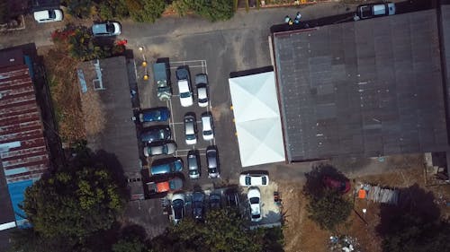 Cars Parked near Houses