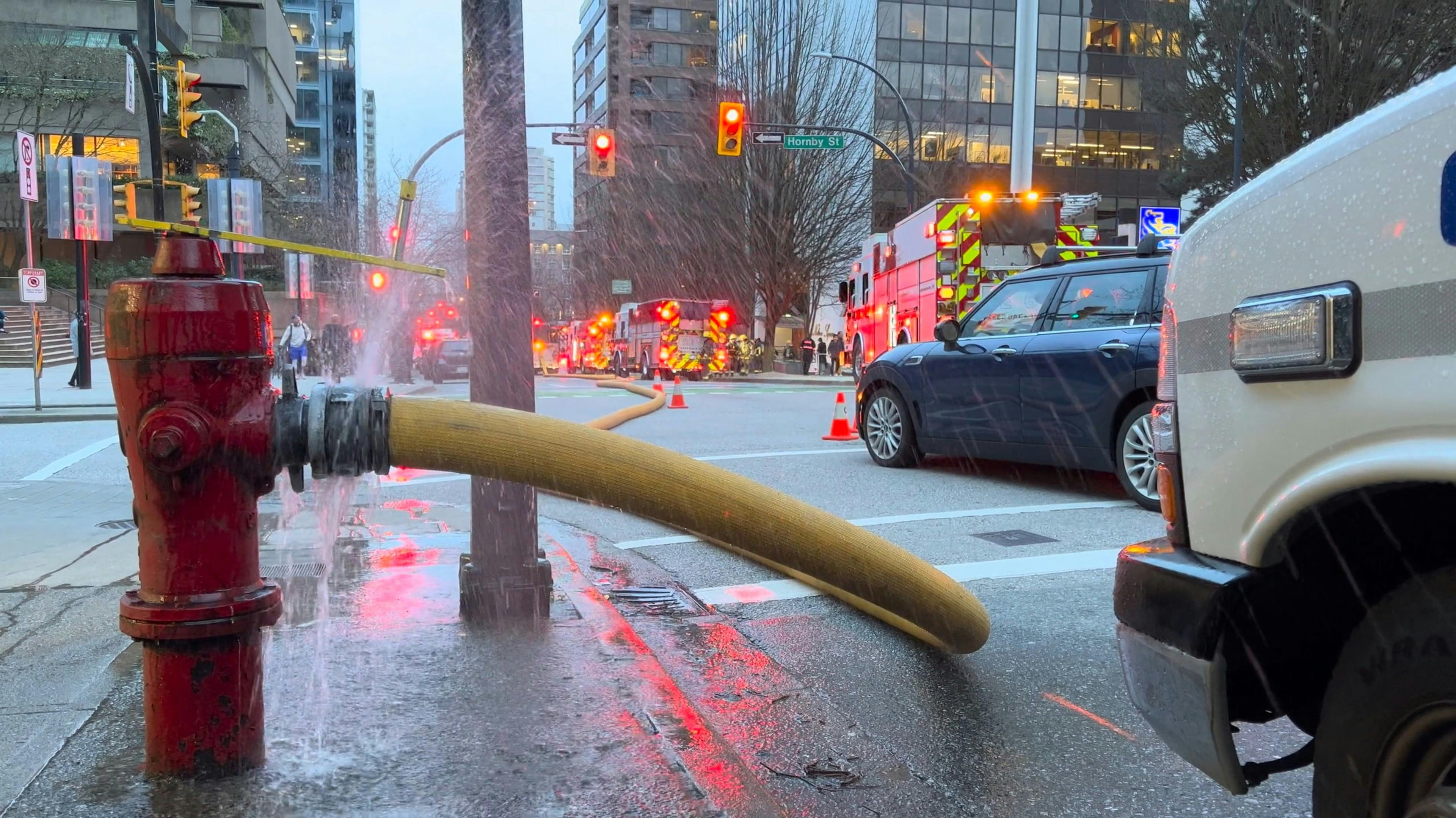 Leaking Fire Hydrant on City Street Free Stock Video Footage, Royalty
