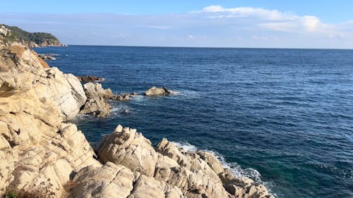 A Rocky Coast and Calm Sea Waters