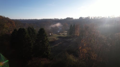 Drone Footage of a Farm on a Misty Autumn Morning