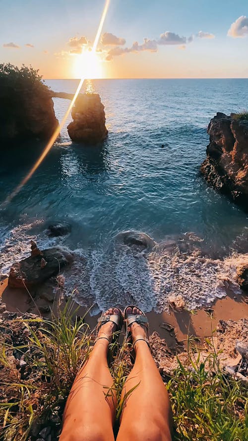 Point of View of a Woman Enjoying a Sunset at the Beach