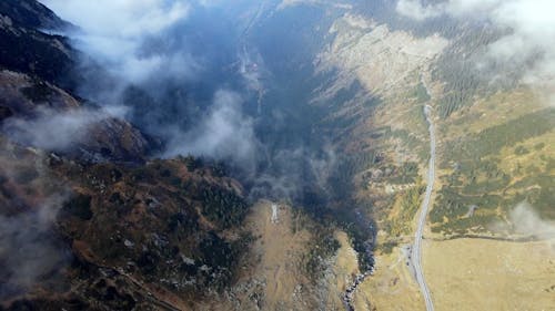 Aerial View of a Road in a Mountain Valley