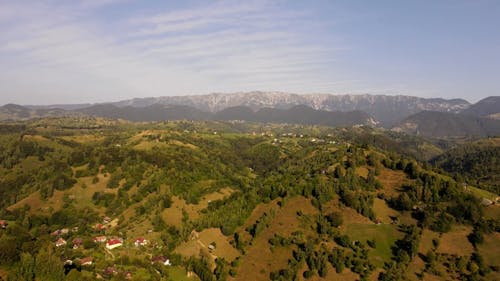 Panoramic View of a Mountain Landscape and a Town in the Valley