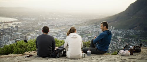 Three People Having a Picnic at Lion's Head Mountain, South Africa 