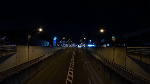 A Moving Cars on the Road at Night