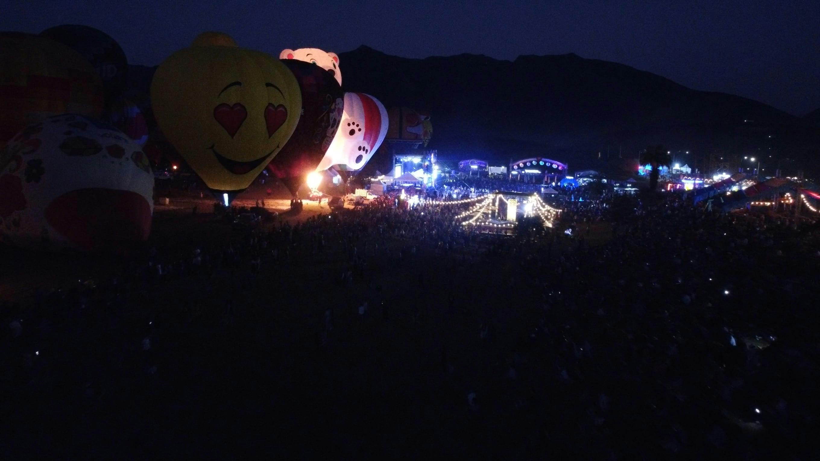 A Drone Footage of Hot Air Balloons with Lights at Night Free Stock